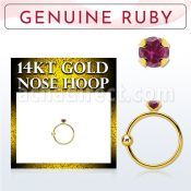 ghge5 14kt gold nose hoop w a 2mm prong set ruby stone