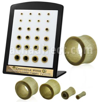 brdpwy display w 24 of crocodile wood double flare flesh tunnel