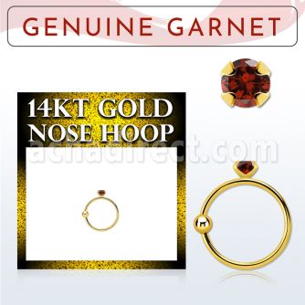 ghge2 14kt gold nose hoop w a 2mm prong set garnet stone
